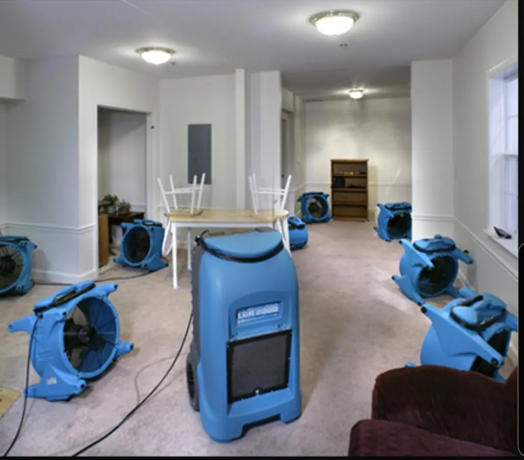 Air movers and dehumidifier setup for Water Extraction & Removal in Brewster